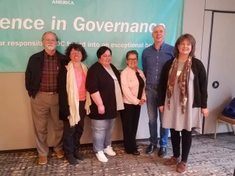 Photo of the ROC Association Directors, Paul Bradley and Diane Gasaway along with an expert coach at the beginning of the 18-month Excellence in Governance training.