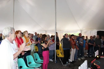 Photo of audience applauding from