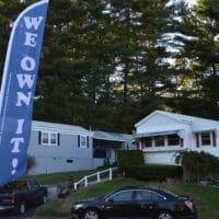 Photo of sign announcing purchase at Halifax Estates.